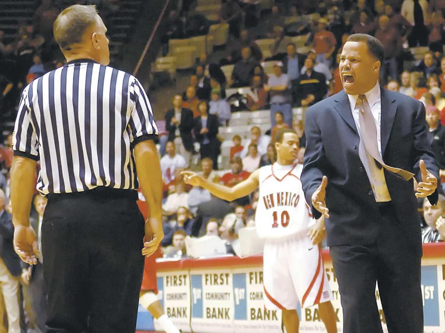 Head coach Ritchie McKay yells at official Chris Rastatter during the second half of Tuesday's game against San Diego State at The Pit. The Lobos lost 81-74 in overtime.