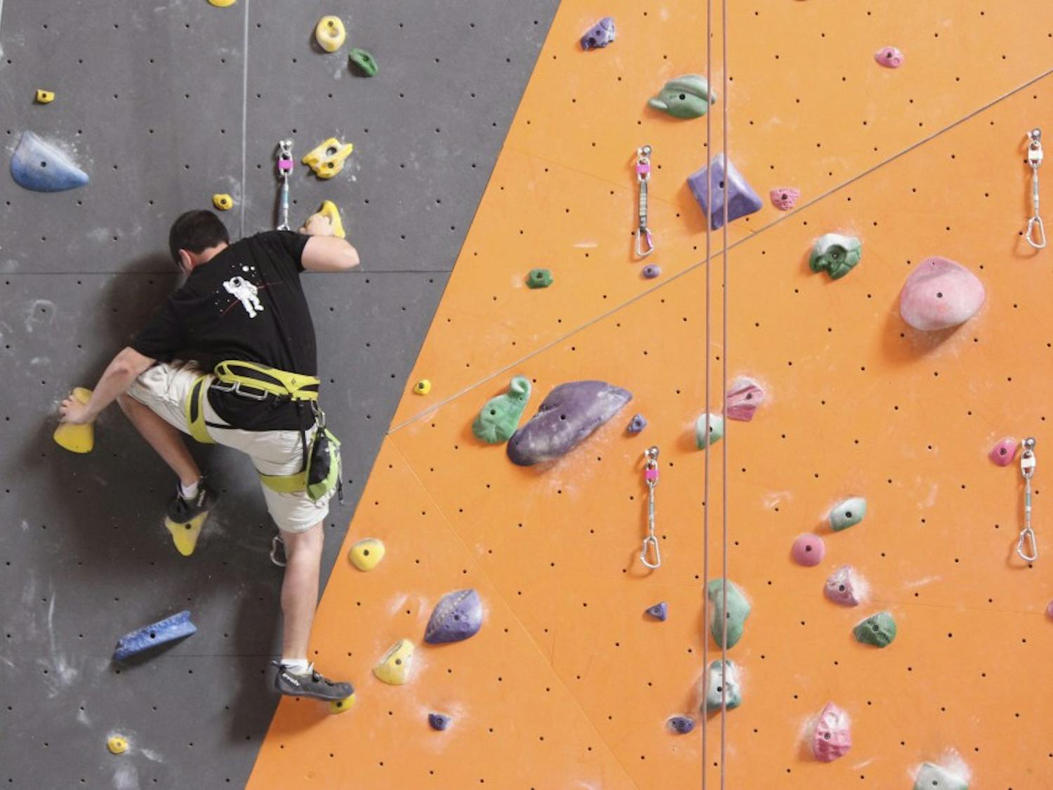 Zach Gallegos climbs at Stone Age Climbing Gym as part of his training to earn a potential spot for the Mars One Mission.