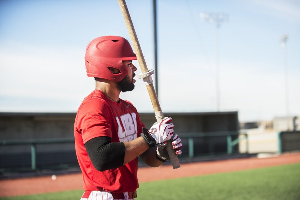 Junior outfielder Andre Vigil warms up to bat at the Lobos’ first practice at Santa Ana Star Field. The Lobos will play their first home game Friday at 6 p.m. against Wichita State after going 3-1 in their first series of the season at Hawai’i.