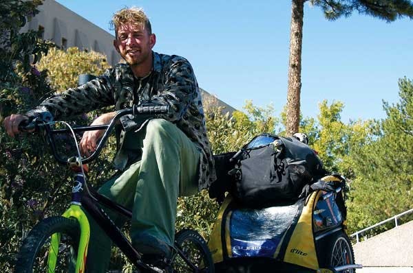 David Wray is riding his BMX bicycle across the country.  He is resting in Albuquerque while his broken shoulder heals.  