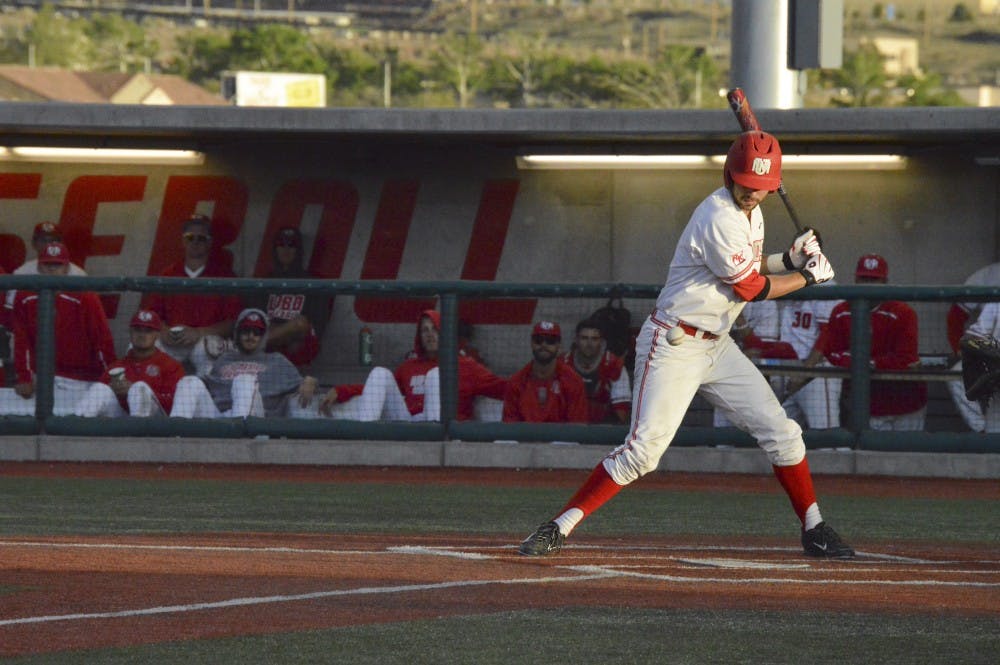 UNM catcher Lane Milligan bats the ball Tuesday night at Lobo Field against Grand Canyon. The Lobos play Grand Canyon again tonight at Lobo Field. 