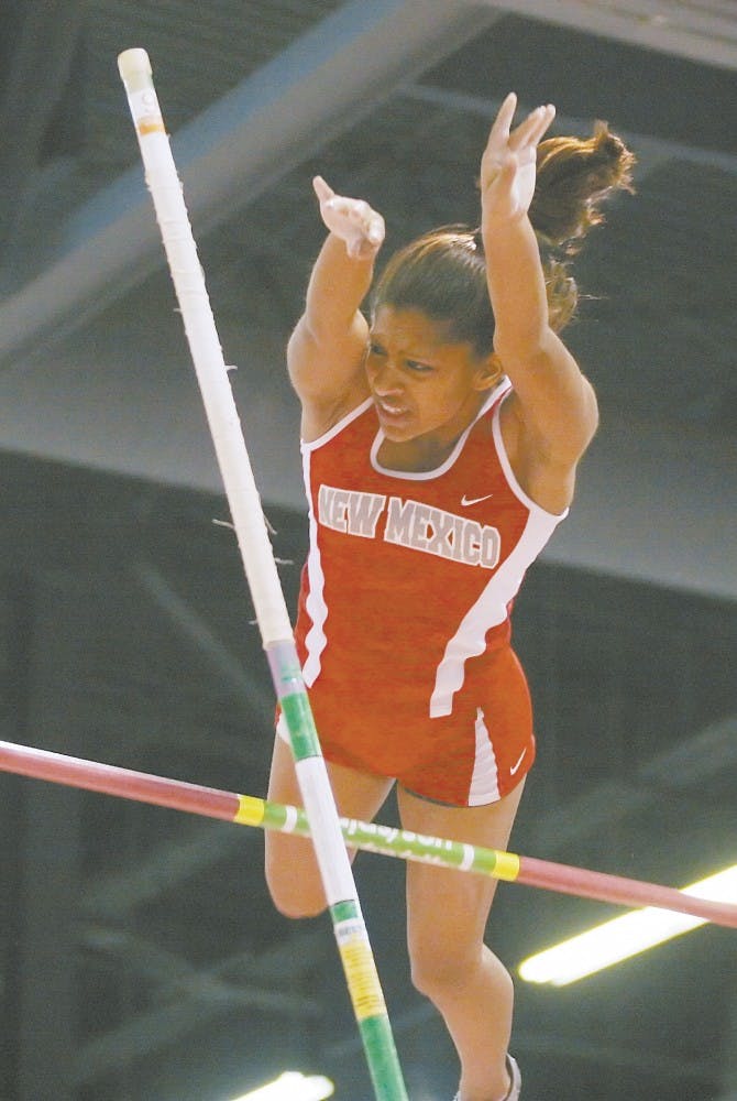 Pole vaulter Aditi Majumdar clears the bar at 3 meters to finish third at the Dennis Heimrich Invitational on Friday at the Albuquerque Convention Center. 