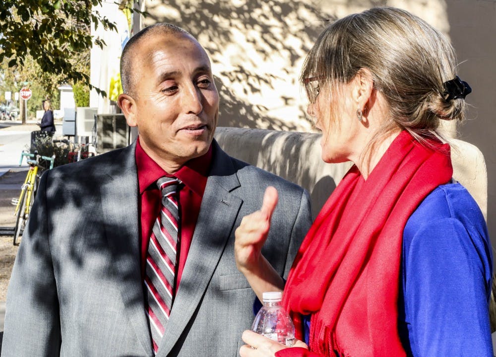 Student Veterans of UNM President Eliberto Calderon (left) and Senior Alumni Relations Officer Maria Wolfe talk during the grand opening of the Academic Affairs & Student Veterans building on Nov. 10, 2017. The facility is located on Buena Vista Dr. 