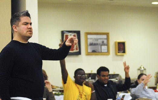 Christopher Ramirez, who was elected council chairman of GPSA on Saturday, counts votes during a meeting in the SUB. 