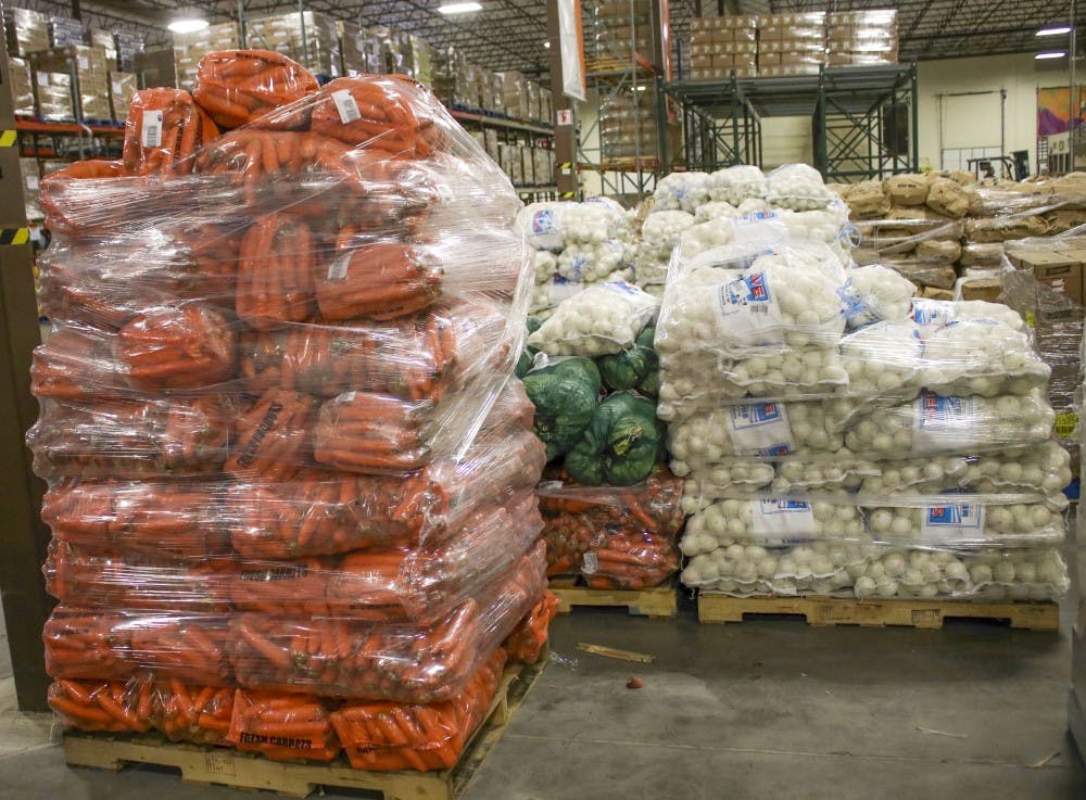 Food is stacked high at Roadrunner Food Bank on Wednesday, Feb. 22, 2017. The produce is being prepared for shipment to distribution organizations like the Lobo Food Pantry.