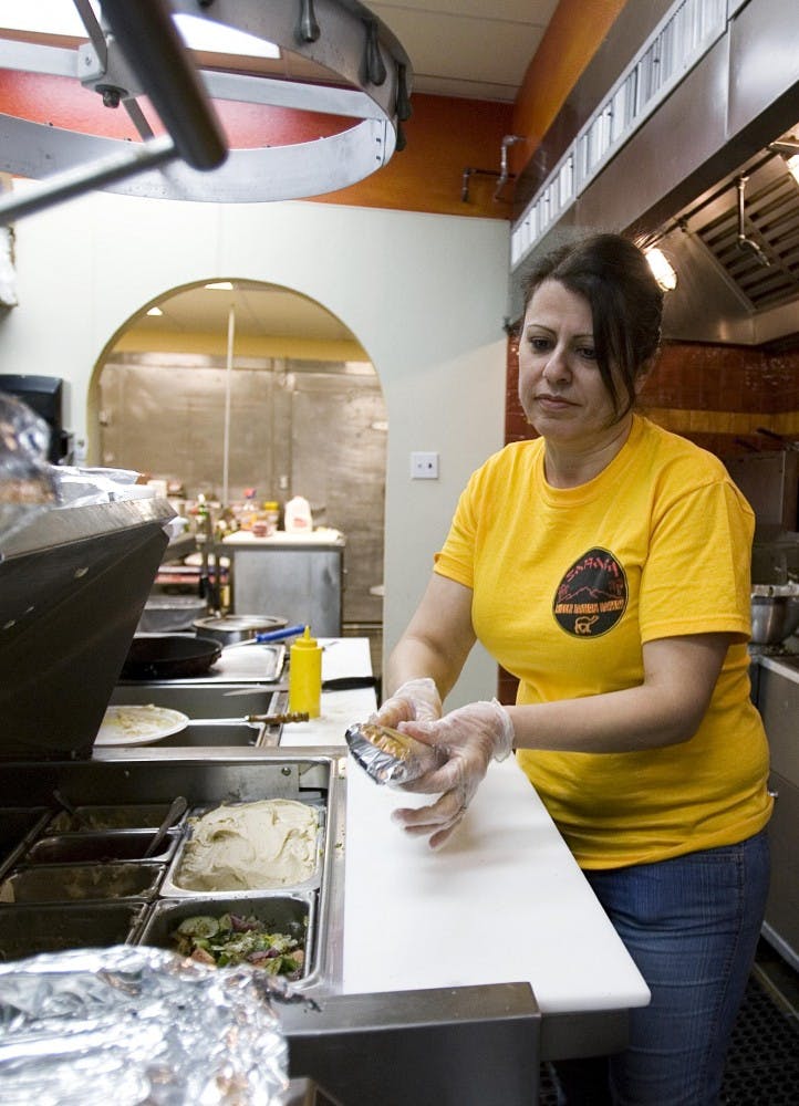 Helen Nesheiwat makes a falafel at Sahara Middle Eastern Eatery.