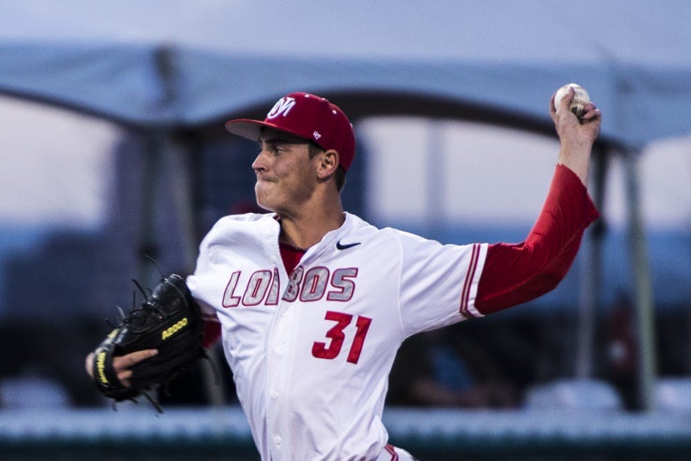 Junior Carson Shneider&nbsp;pitches at Santa Ana Star Field. The Lobos beat Sacramento State in the final game of a two game series, 12-3, in Sacramento, California.&nbsp;