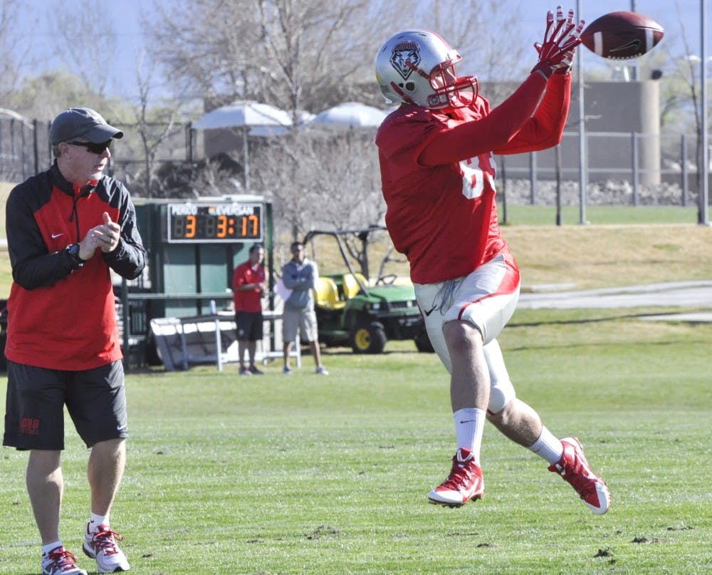 Freshman wide receiver Jacob Willcox makes a catch during Fridays practice. The Lobos took strides on National Signing Day last month by signing four new wideouts. 

