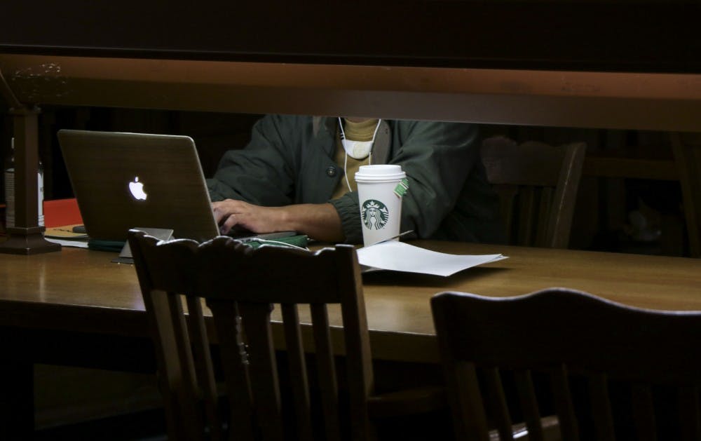 Students study hard in Zimmerman Library on the evening of Dec. 2, 2018.