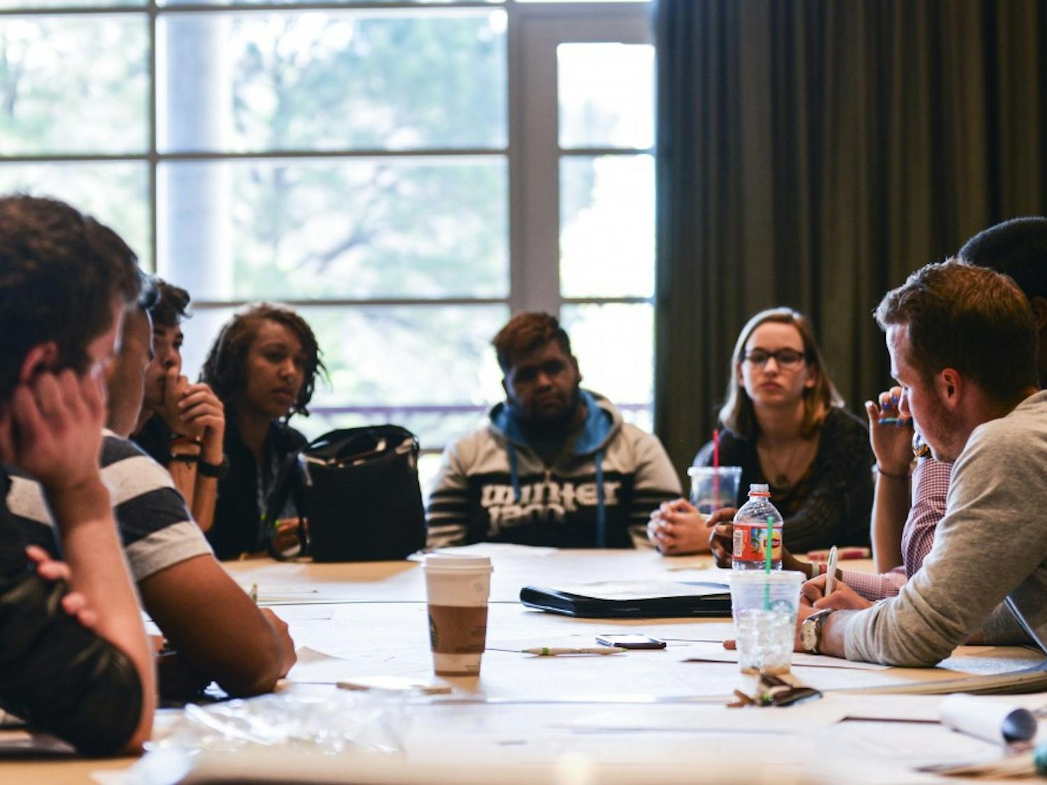 Students discuss safety issues and potential solutions Tuesday evening in a SUB ballroom. The event was organized by LoboRESPECT to address concerns raised at ASUNM’s recent Safety Day.
