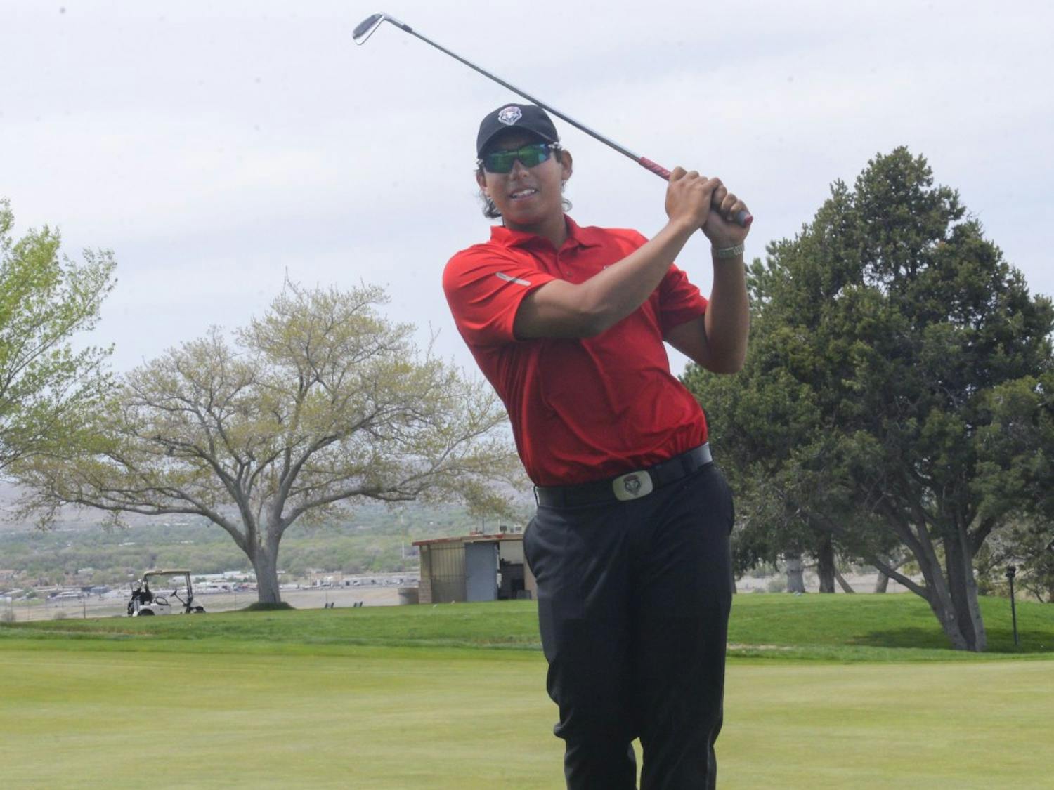 UNM senior golfer Gavin Green follows through on a shot on April 2 at the Championship Golf Course.Green has been named among the semifinalists for the Ben Hogan Award.  
