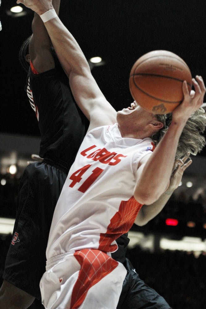 	Senior forward Cameron Bairstow goes for a layup during the game against San Diego State at the Pit on Saturday. Bairstow scored 26 points, his 25th double-figure scoring game of the season, and the 16th time this season. His previous career-high before this season was 17 points and has moved up a spot into 27th place on the career scoring list with 1,077.