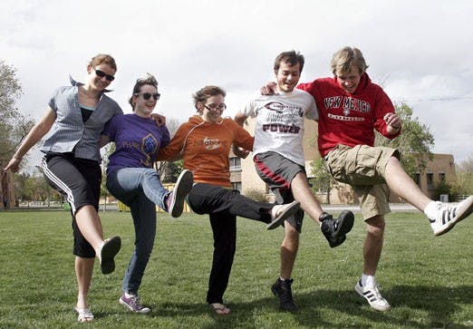 From left: Briana Van Treeck, Andrea Schoeny, Alanna Carlson, Read Langhenry, and Danny Birdsell at Laugh Club at Lower Johnson Field on Tuesday.