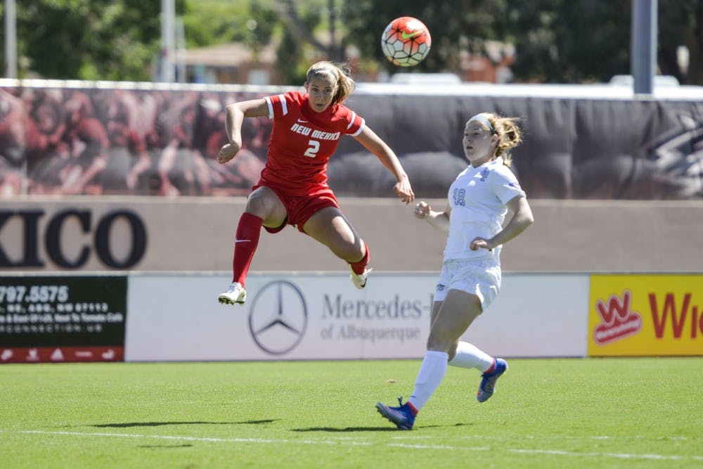 Redshirt senior Katie Hinman floats in the air after sending the ball to a fellow teammate on Sunday, Sept. 25, 2016 at the UNM Soccer Complex. The Lobos will play Wyoming this Friday at 7:30 p.m..