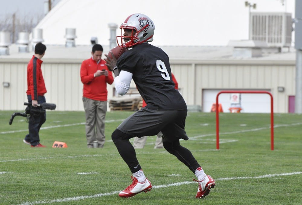 Redshirt Freshman Lamar Jordan looks to make a pass Wednesday morning during spring football practice at the Tow Diehm complex. Jordan said he looks forward to the competition for his spot in the team.