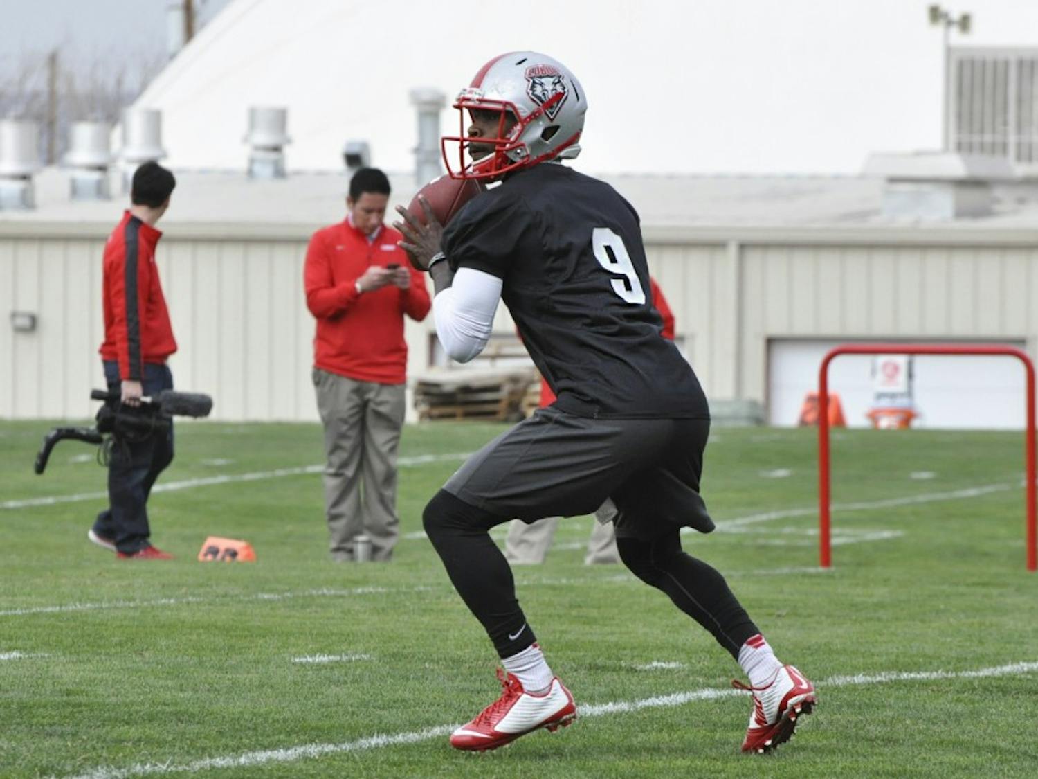 Redshirt Freshman Lamar Jordan looks to make a pass Wednesday morning during spring football practice at the Tow Diehm complex. Jordan said he looks forward to the competition for his spot in the team.