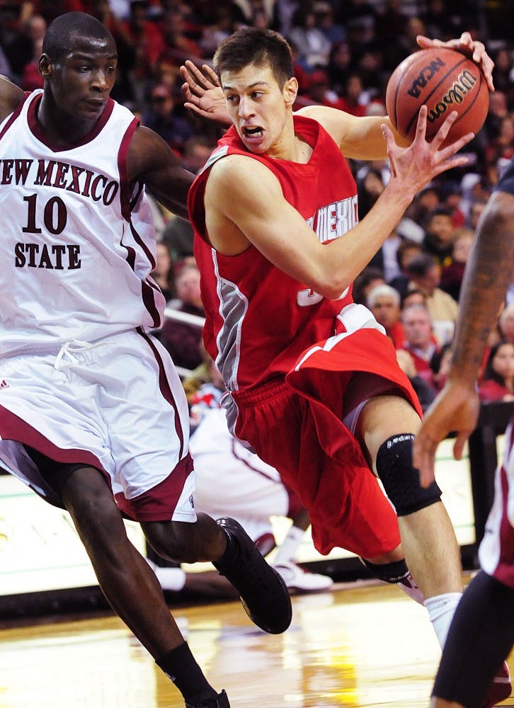 	Forward Roman Martinez paced the Lobos with 24 crucial points, many of them coming in gutcheck
time. The Lobos went on to win 97-87 over the Aggies Tuesday.