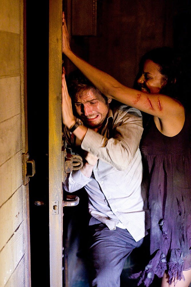 Rob (Michael Stahl-David), left, and Lily (Jessica Lucas) in the movie "Cloverfield."