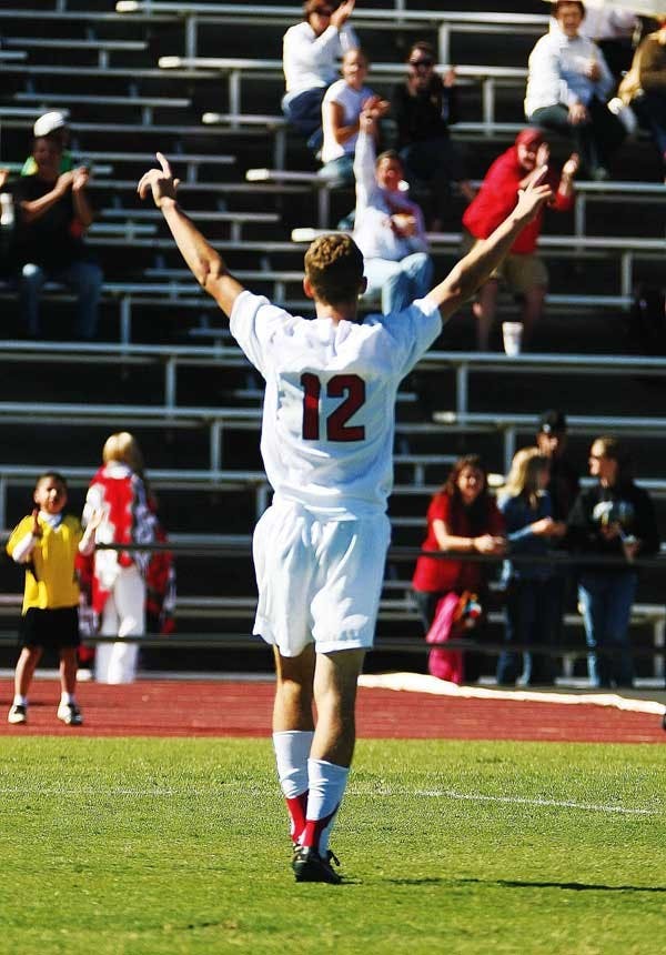 UNM forward Chris Wright celebrates after scoring against Air Force on Sunday at Robertson Field. The Lobos won 6-0. 