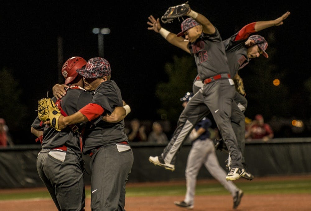 Lobo pitcher Tyler Stevens embraces Andrew Pratt, catcher, after pitching a complete game during the opening&nbsp;Mountain West Championship game&nbsp;Thursday night at the Santa Ana Star Field. The 7-2 victory against Nevada advances the No. 1 seated Lobos to the next round against No. 2 San Diego State, Friday night @  7 p.m.