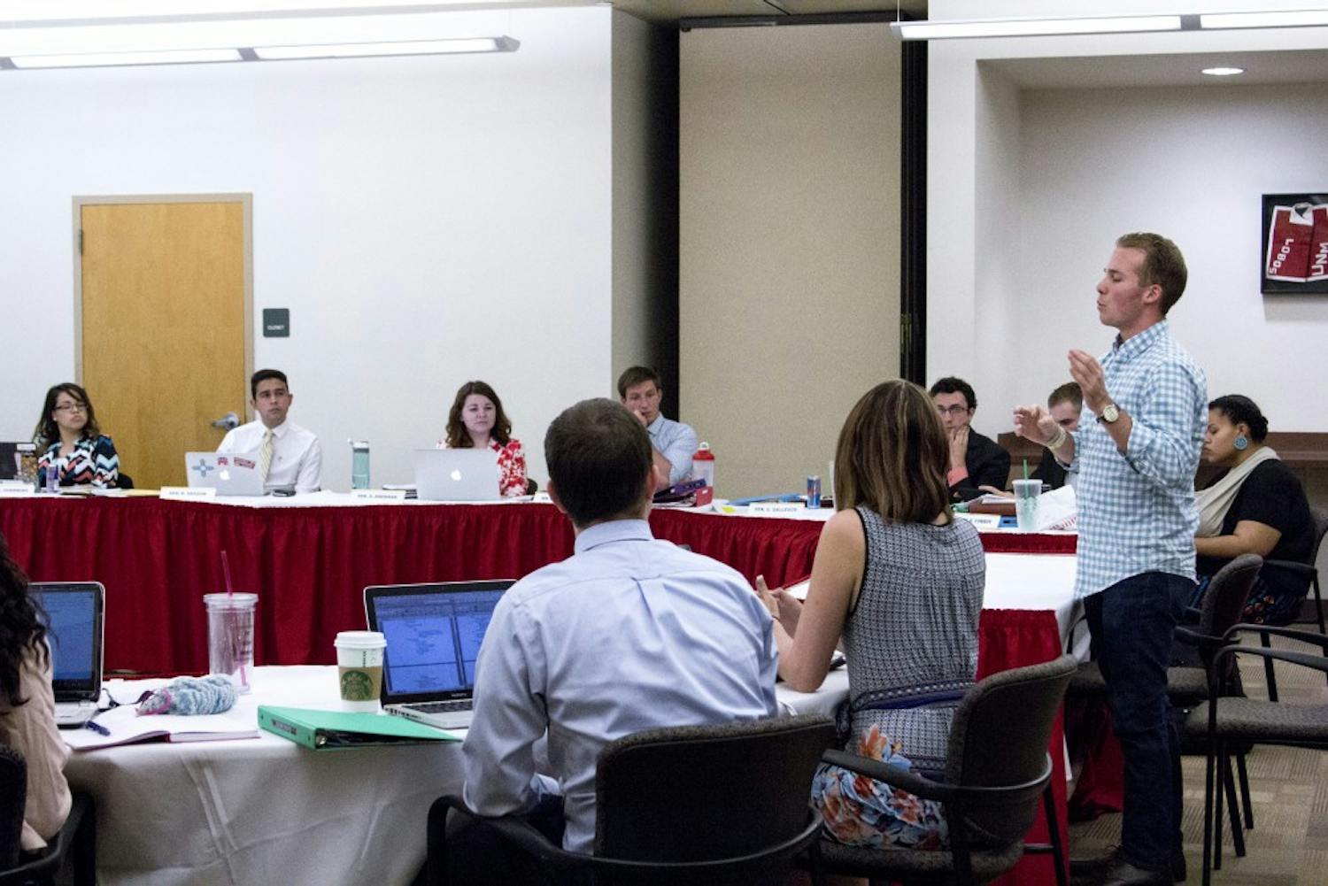 During Wednesday evening’s ASUNM Senate meeting, Kyle Stepp approaches the ASUNM board in defense of President Jenna Hagengruber’s decision to hire Kyle Biederwolf as the Emerging Lobo Leaders executive director.