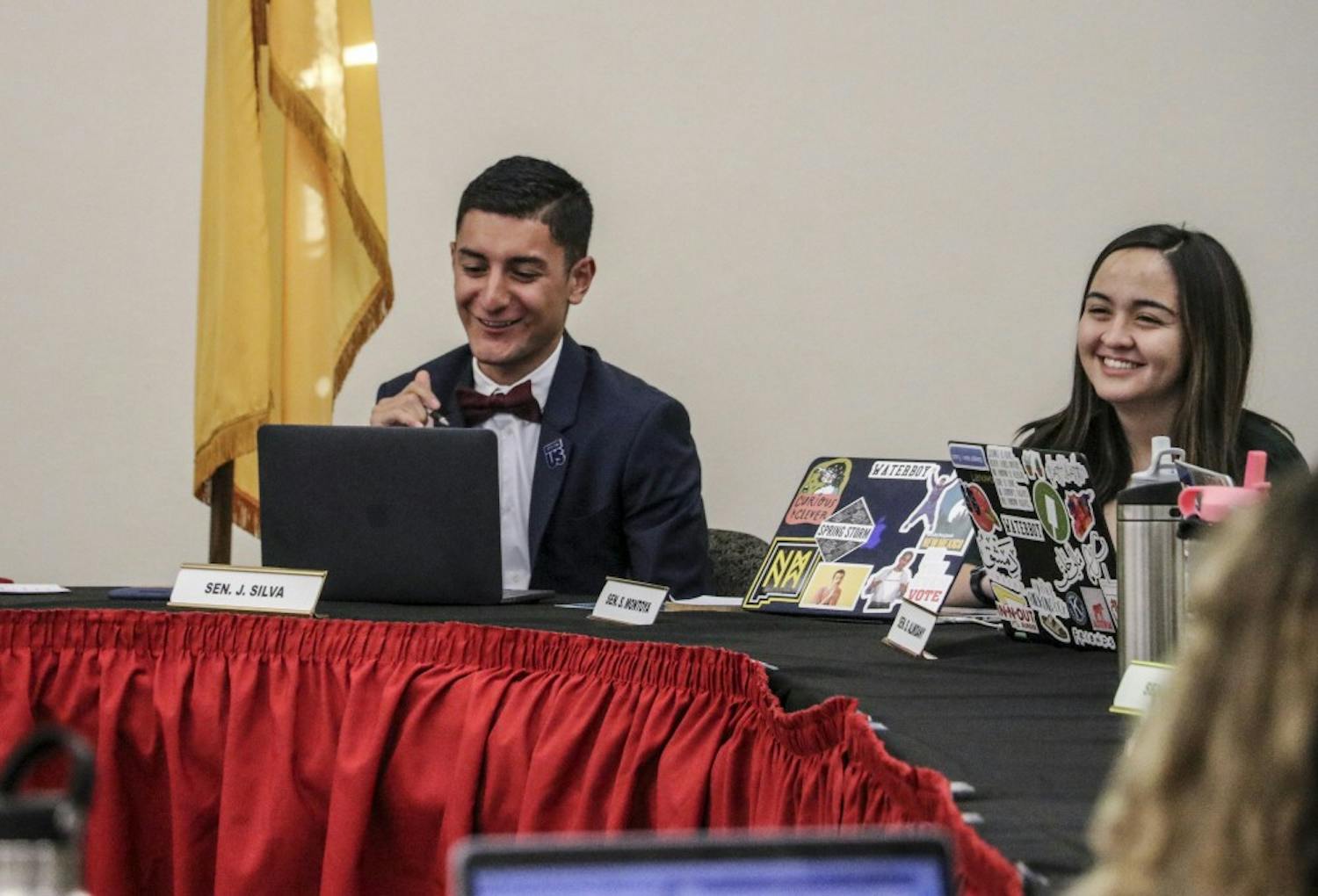 Senators Jacob Silva and Selina Montoya laugh during the ASUNM full senate meeting on August 29, 2018.