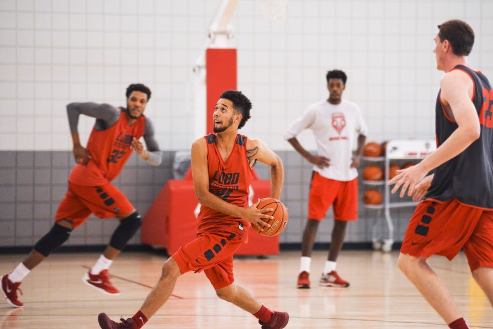 Sophomore guard Anthony Mathis practices drills on Friday, Sept. 30, 2016 at the Davalos Training Center.