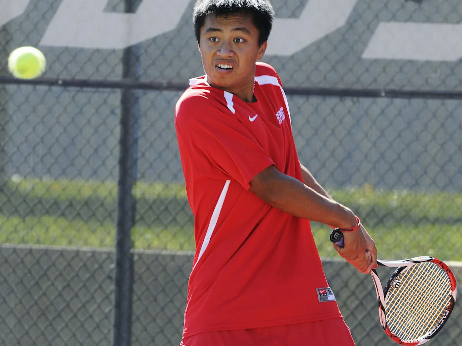 Carl Ho rears up to return the ball during Sunday’s Balloon Fiesta Invite. Ho went 4-0 over the weekend and won the individual title.