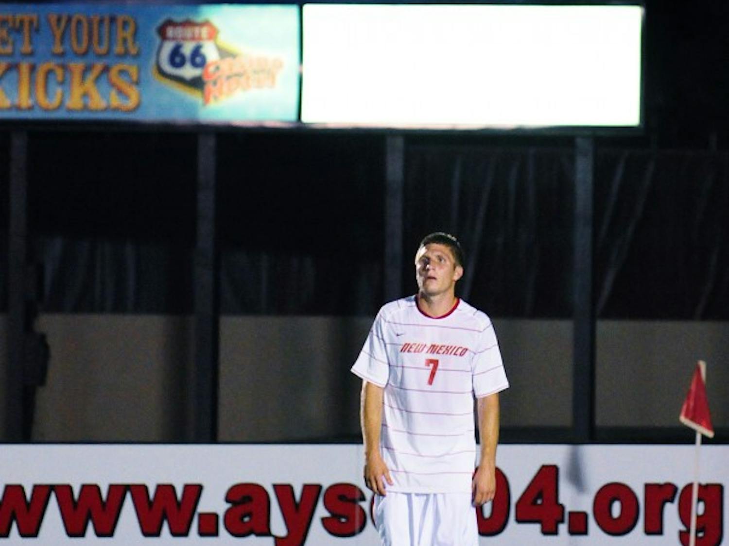 	Forward Justin Davis walks off the field after the Dons upended the Lobos Saturday at the UNM Soccer Complex.