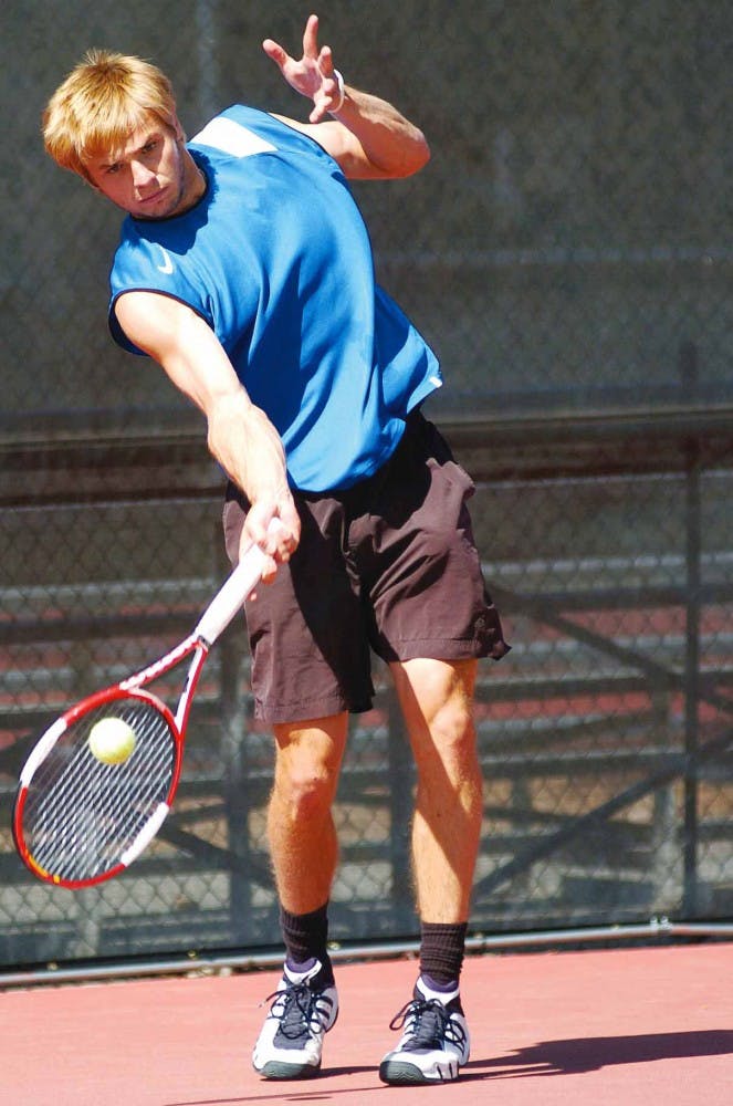 UNM's Max Jones hits a forehand at Tanoan Country Club on Friday. 
