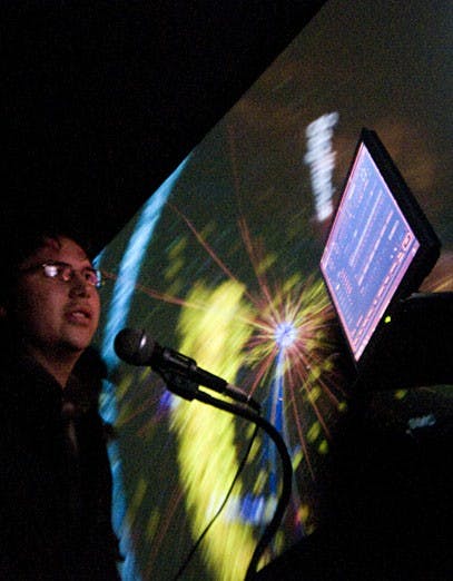 J.R. Willoughby operates the planetarium's dome theater at the New Mexico Museum of Natural History and Science on Monday.