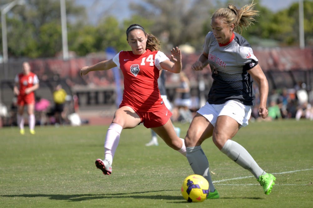 Midfielder Claire Lynch looks to make a play on the ball against Fresno States Fanny Johansson at the UNM Soccer Complex Sunday, Oct. 18, 2015. The Lobos play Colorado College this Friday. 