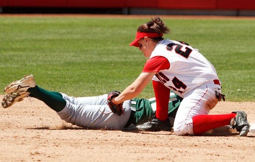 Infielder Katie Gilmore tags out a Colorado State runner at second base during Sunday's 4-1 win at the Lobo Softball Field. 
