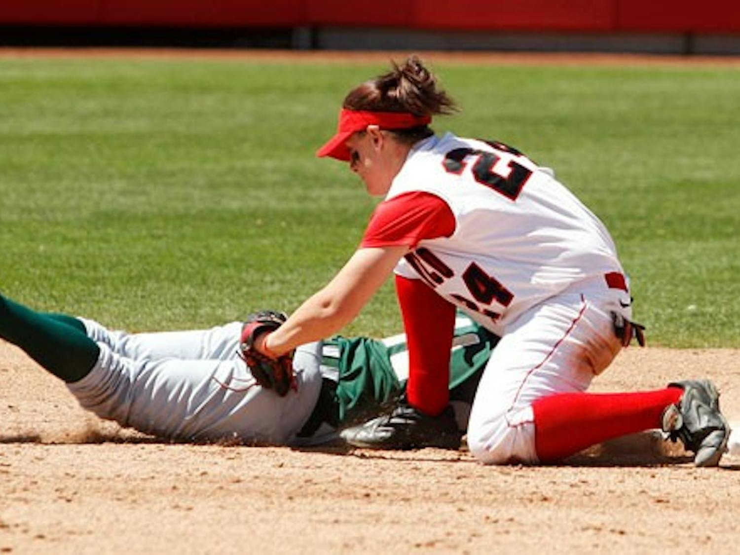 Infielder Katie Gilmore tags out a Colorado State runner at second base during Sunday's 4-1 win at the Lobo Softball Field.