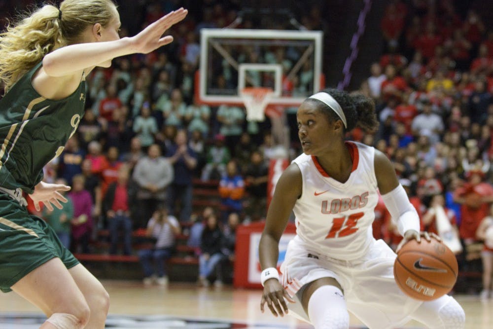 Senior guard Bryce Owens looks past a Colorado State player to make a play Wednesday night at WisePies Arena. The Lobos lost to Fresno State Saturday night 51-43.