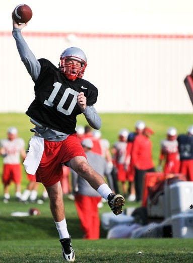 Lobo quarterback Brad Gruner throws the ball at practice on Tuesday. UNM will face San Diego State on Saturday at University Stadium. 