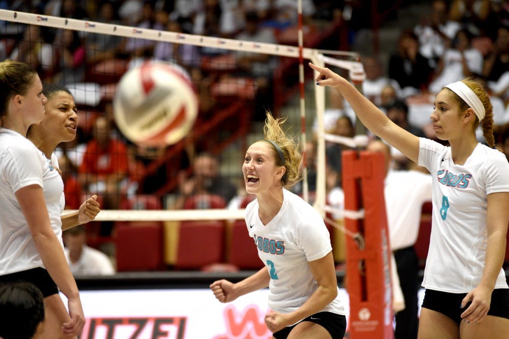 UNM setter Hannah Johnson celebrates a point during Saturday’s match against Louisiana State University. The Lobos lost to LSU 2-3 and will play at Johnson Center september 24th.