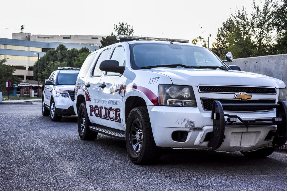 Two UNM Police cars wait to be used.&nbsp;