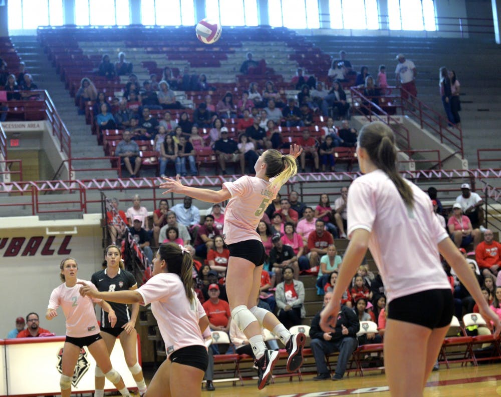 Outside hitter Julia Warren (5) leaps into the air for the ball at Johnson Center while playing against UNLV Saturday, Oct. 17, 2015. The Lobos lost to San Diego 2-3 on Saturday, Oct. 24.