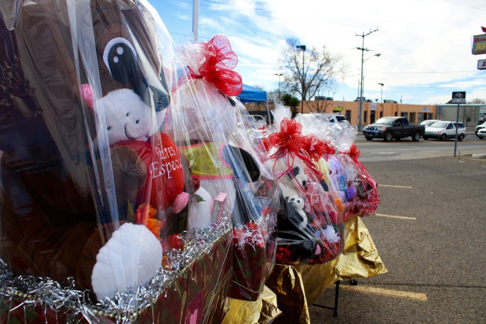 Small Valentines Day presents line up a parking lot near Louisiana and Zuni Saturday, Feb. 11, 2017 in Albuquerque, New Mexico.&nbsp;