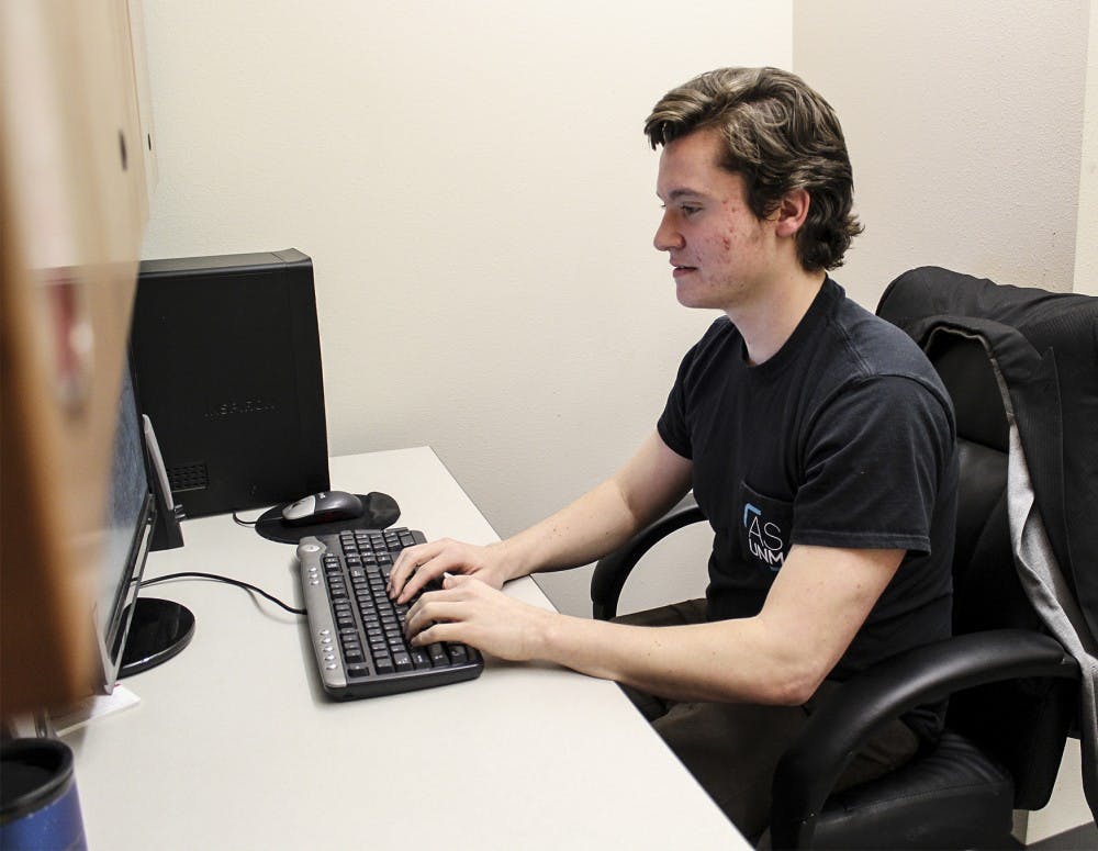 Adrian Schmitt, the programs coordinator for ASUNM governmental affairs, sits in one of the student government offices on the lower level of the Student Union Building on March 1, 2018. He visited the Roundhouse during this year’s legislative session to advocate for students to have more scholarship funding.