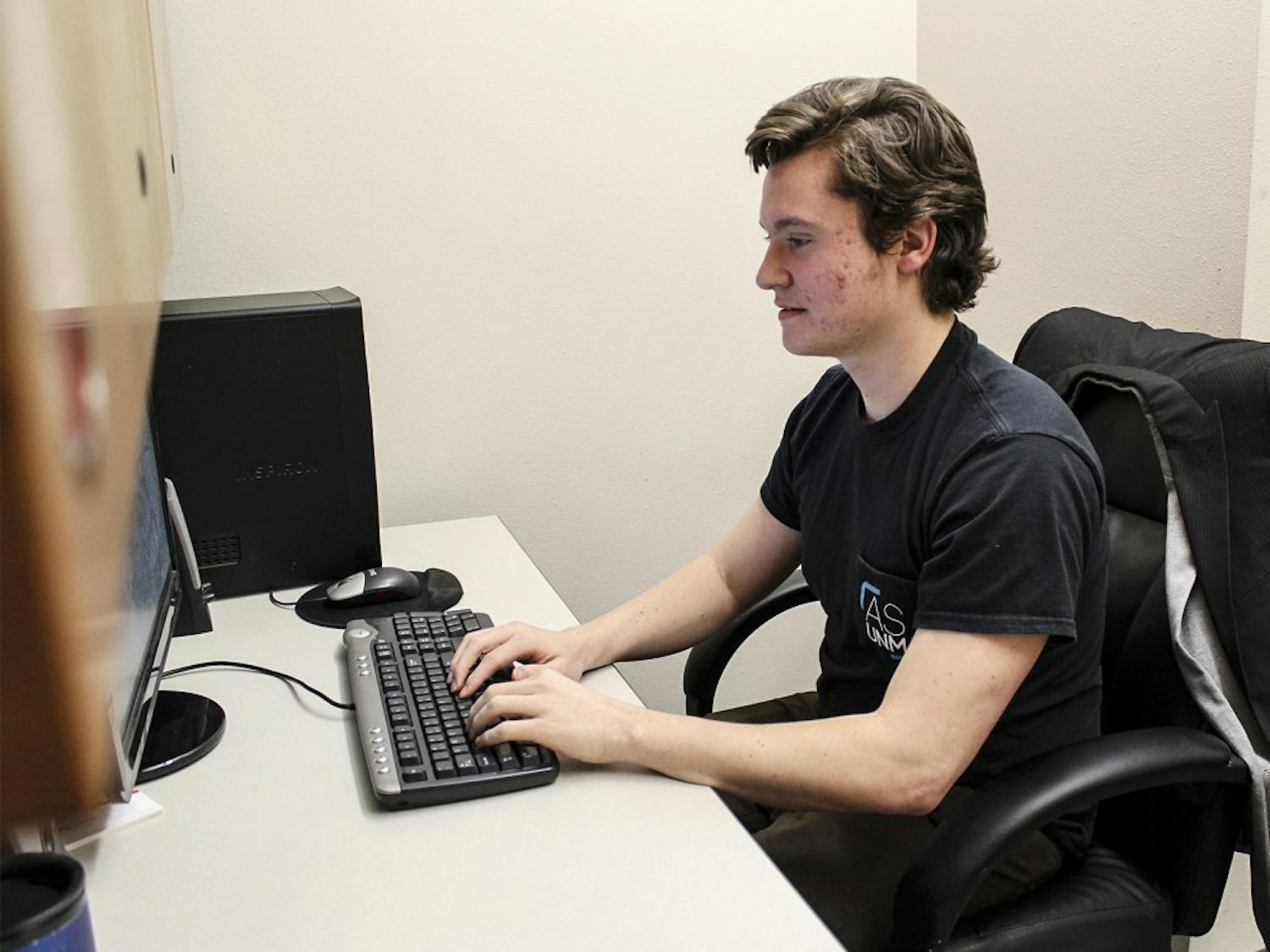 Adrian Schmitt, the programs coordinator for ASUNM governmental affairs, sits in one of the student government offices on the lower level of the Student Union Building on March 1, 2018. He visited the Roundhouse during this year’s legislative session to advocate for students to have more scholarship funding.