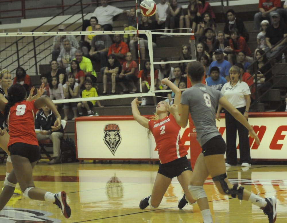Setter Hannah Johnson saves the ball during the game against UC Irvine last September at the Johnson Center. The Lobos will play an intrasquad scrimmage tonight at 6:30 p.m.