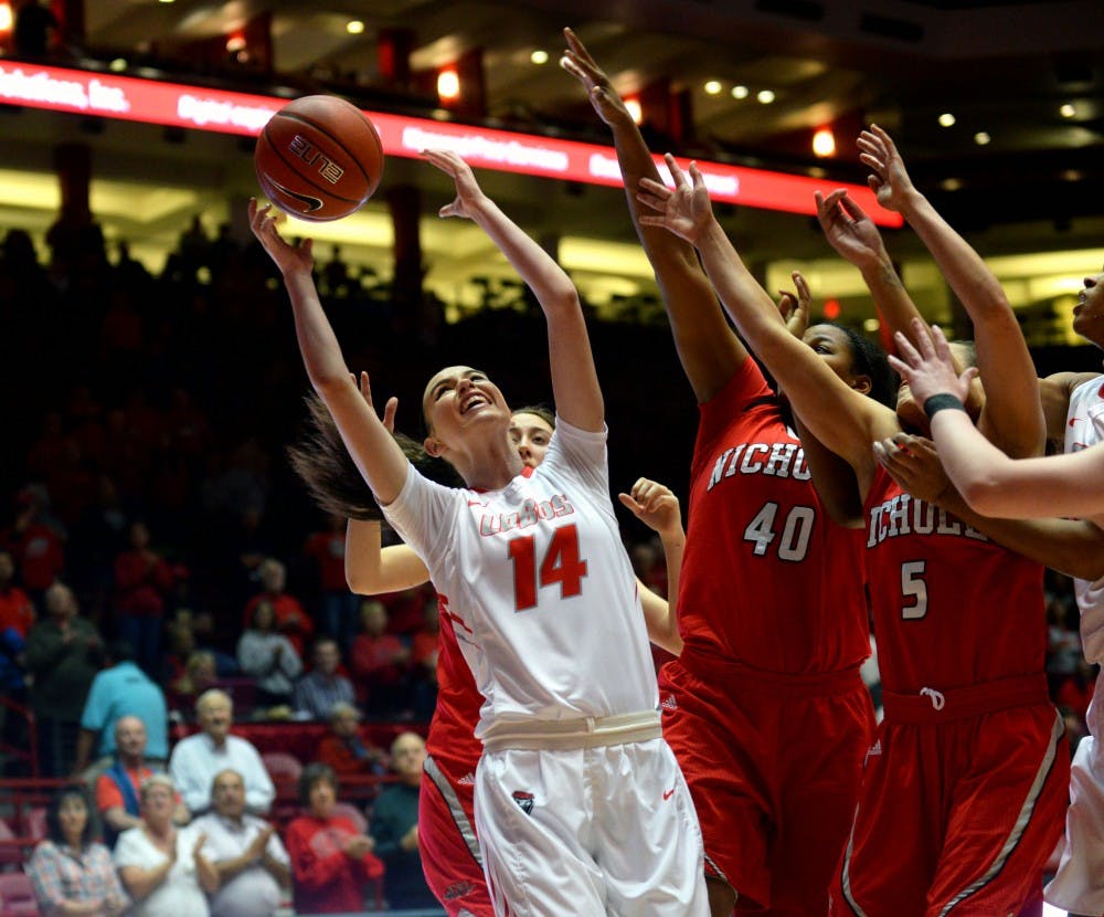 Freshman forward Jannon Otto grabs the ball against Nicholls State's defense at WisePies Arena Tuesday night. The Lobos beat the Colonels 83-43.