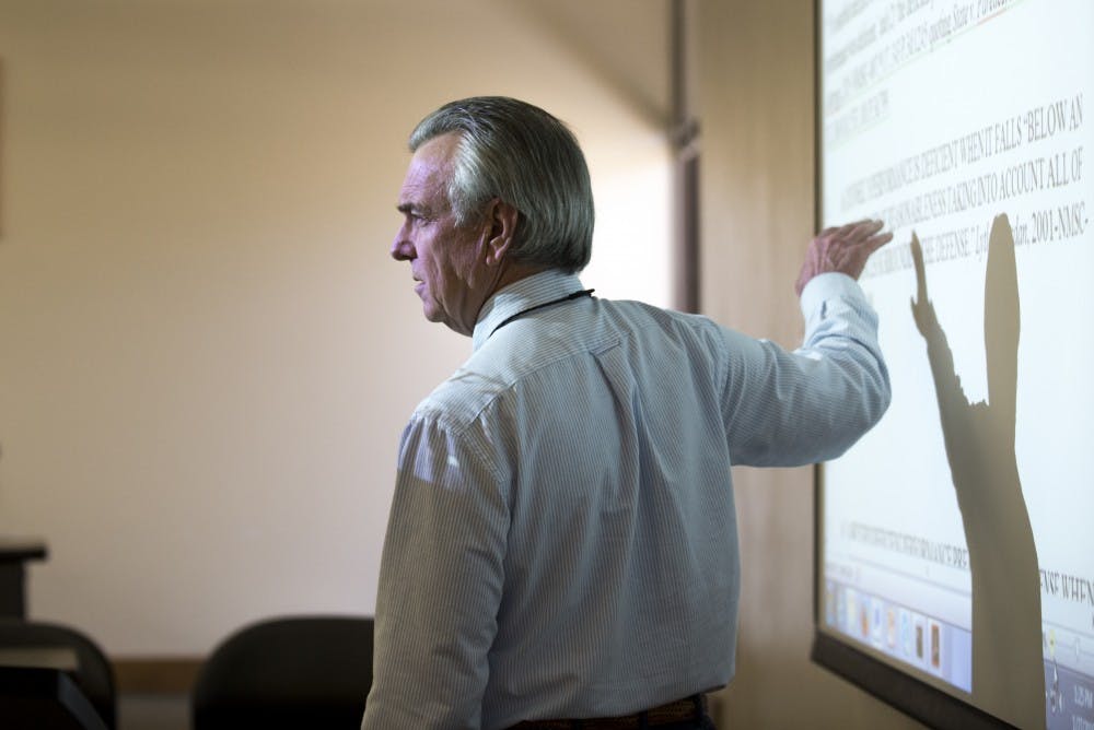 Professor David Stout discusses prosecutor procedure with his Advanced Legal Writing class at the UNM School of Law on Wednesday, Jan. 27, 2015.