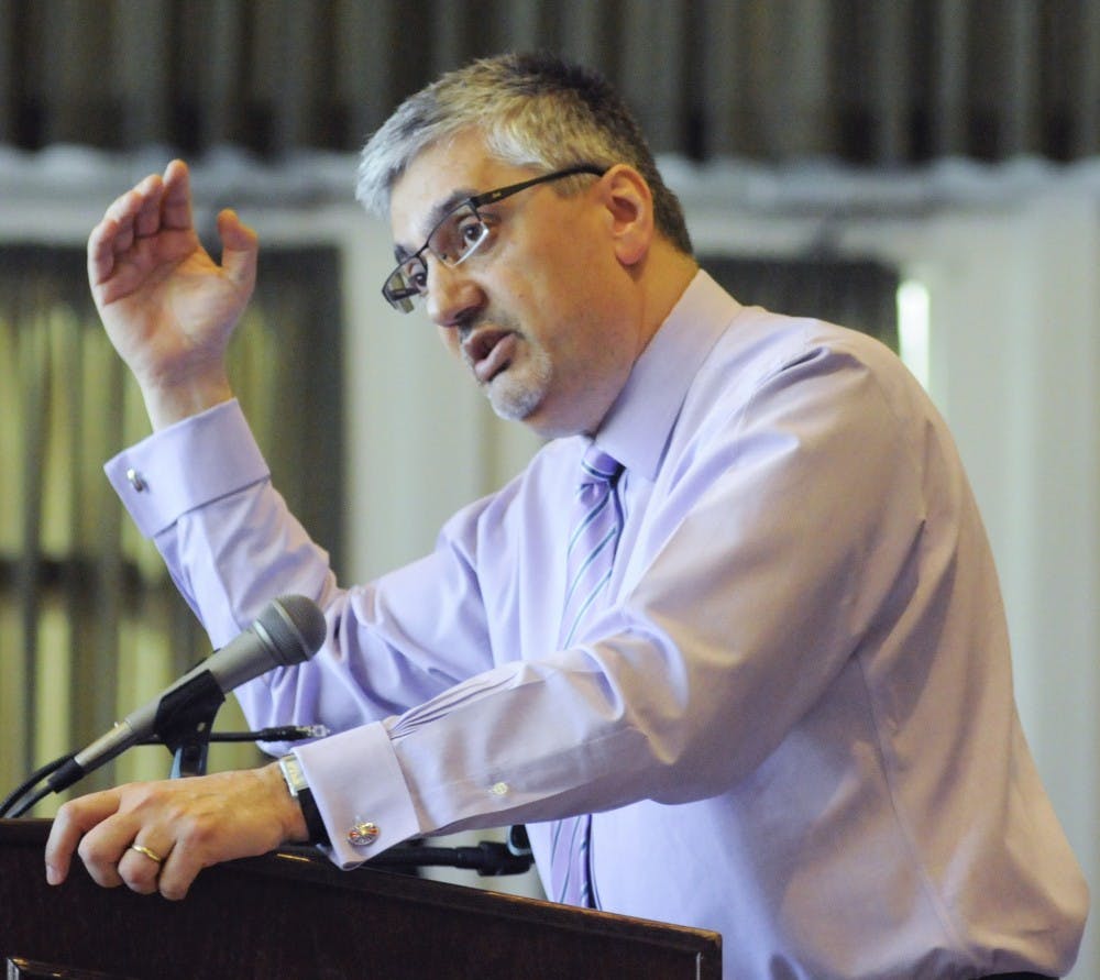 UNM Provost Chaouki Abdallah talks about next years budget at the Board of Regents meeting Friday at the SUB ballroom. The regents approved a 3.37 percent increase in tuition and fees. 