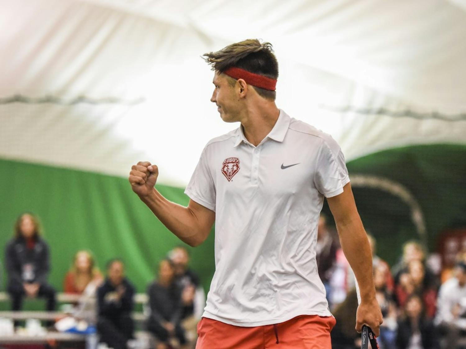 Sophomore Ricky Hernandez-Tong raises his fist after scoring against Fresno State Friday, March 31, 2017. The Lobos will go into this weekends home matches with a three game winning streak. 