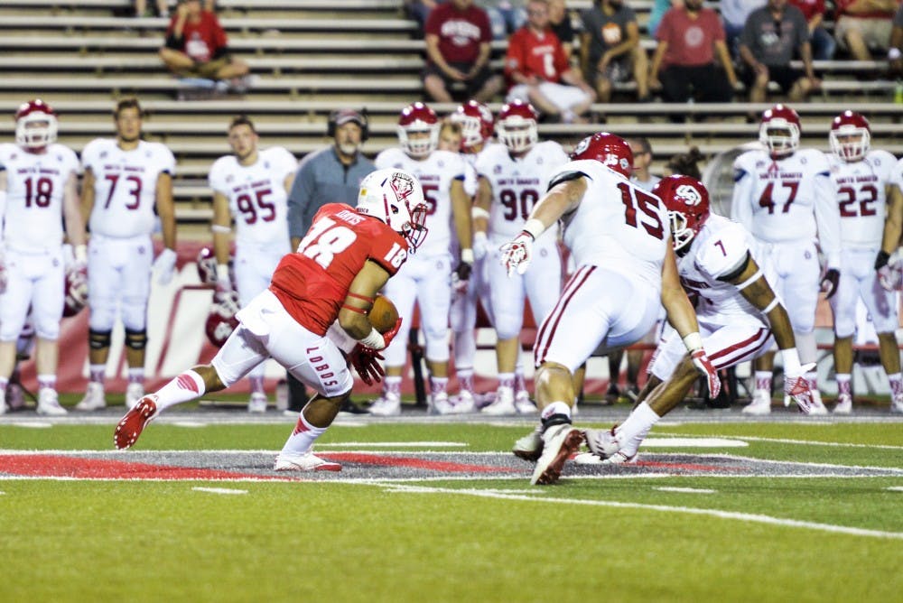 Junior wide receiver Chris Davis, Jr. runs the ball downfield Thursday, Sept. 1, 2016 at University Stadium. The Lobos’ special teams played a pivotal role in their 48-21 victory.