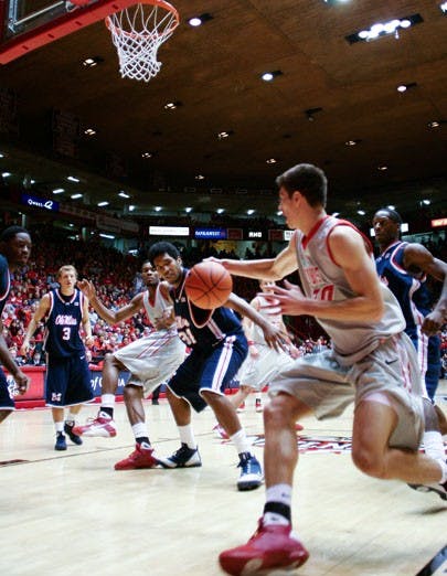 Roman Martinez drives baseline during the Lobos' win over Ole Miss on Saturday. Martinez had a double-double, scoring 17 points and racking up 12 rebounds. 