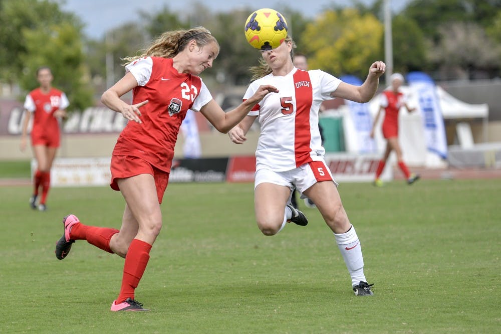 Midfielder Alyssa Coonrod braces for a header while playing against UNLV on Sunday Oct. 4, 2015. The Lobos are playing out of state against Wyoming Oct. 9. 